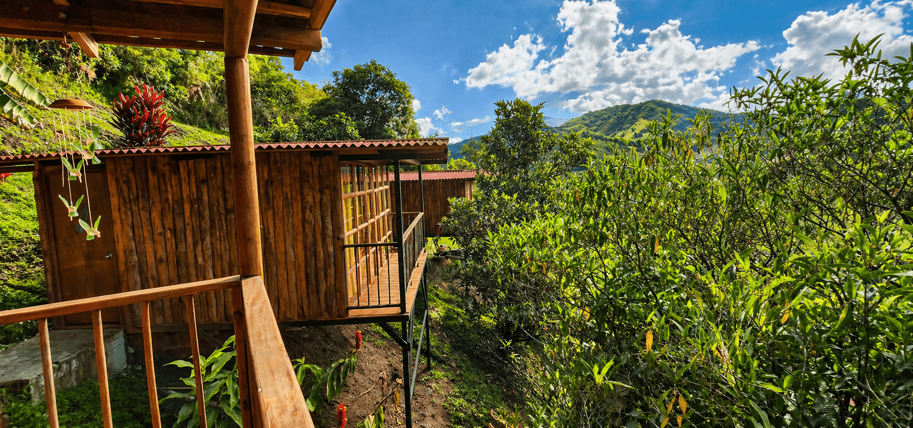 Wooden retreat cabins with mountain views at Yaogara