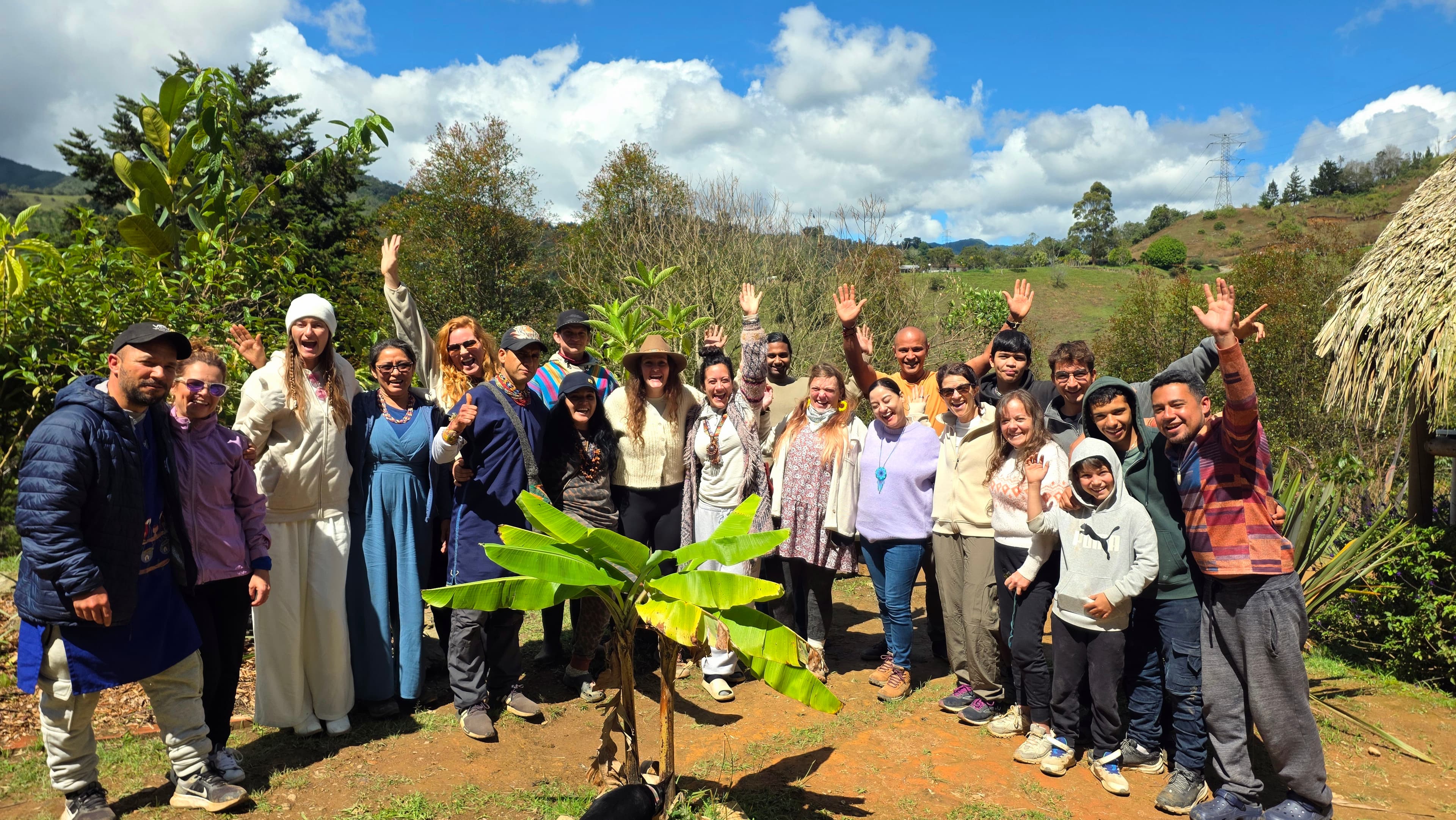 Retreat group gathered outside in the mountains at Camino al Sol