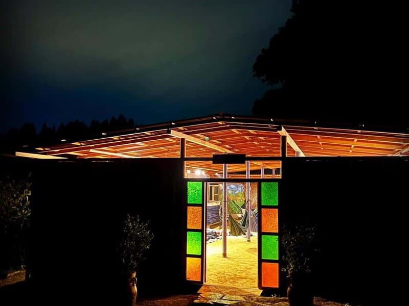 Colombian forest ceremony lights at night
