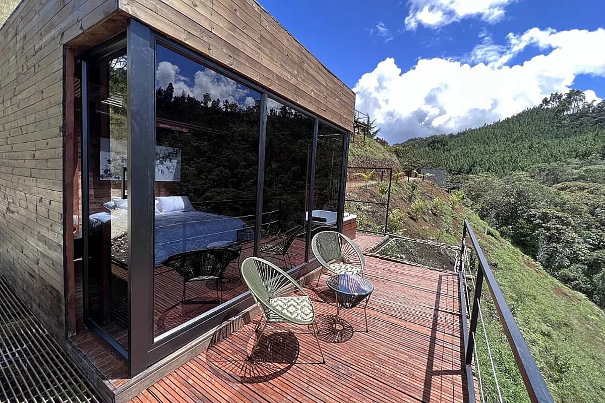 Private cabin exterior surrounded by forest at Yaogará