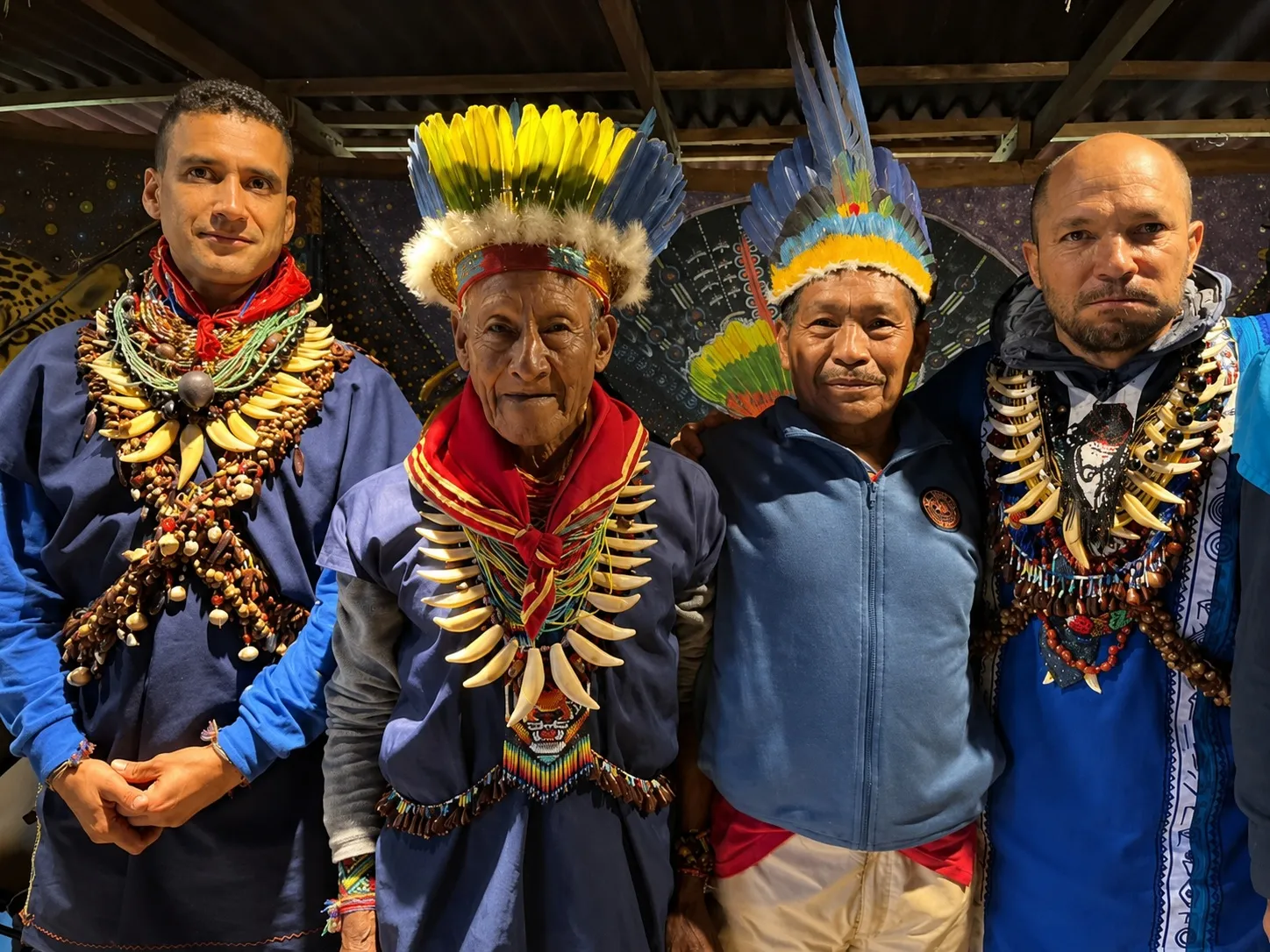 Siona lineage leaders posing together in ceremonial dress